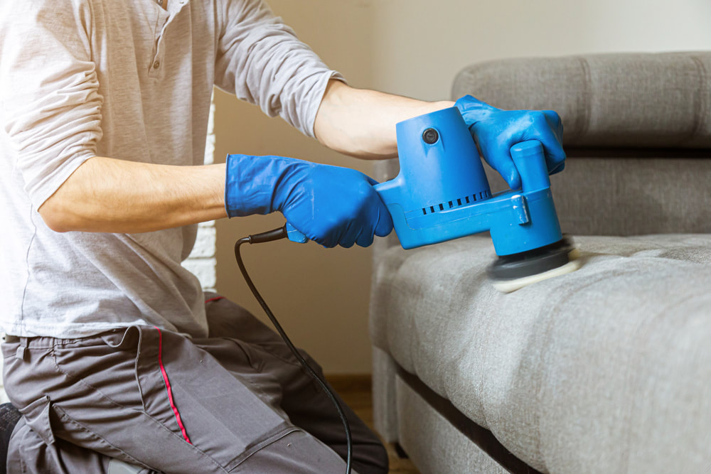 trained upholstery cleaning technician